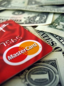 credit card on top of money