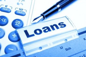 loans, calculator and pen