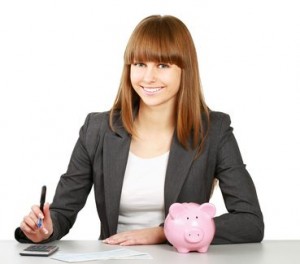 woman with calculator and piggy bank