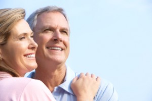 Middle age couple happy about insurance