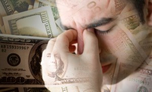 man stressed about money