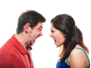 Studio shot of a young couple fighting
