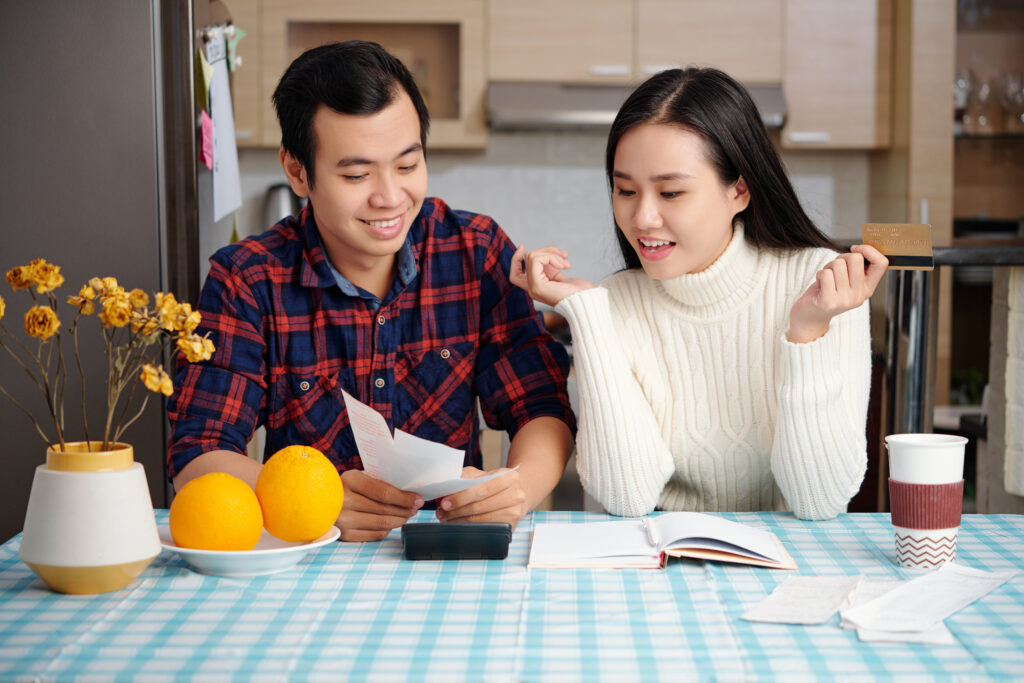 Couple managing household budget to be financially stable