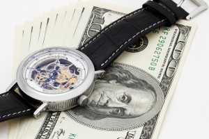 money with wristwatch