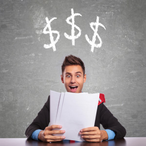 businessman with dollar signs on top of his head