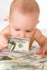 baby holding money