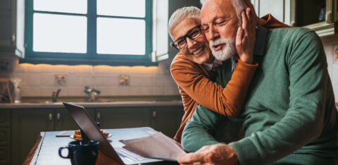Retired couple working on financial planning