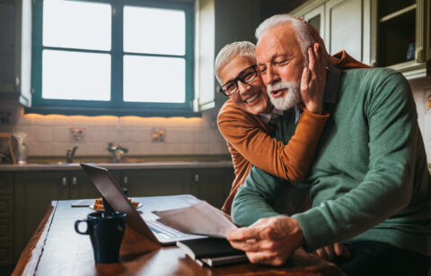 Retired couple working on financial planning