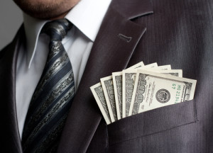 businessman with money in pocket