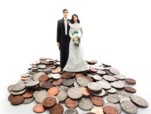 bride and groom on top of coins