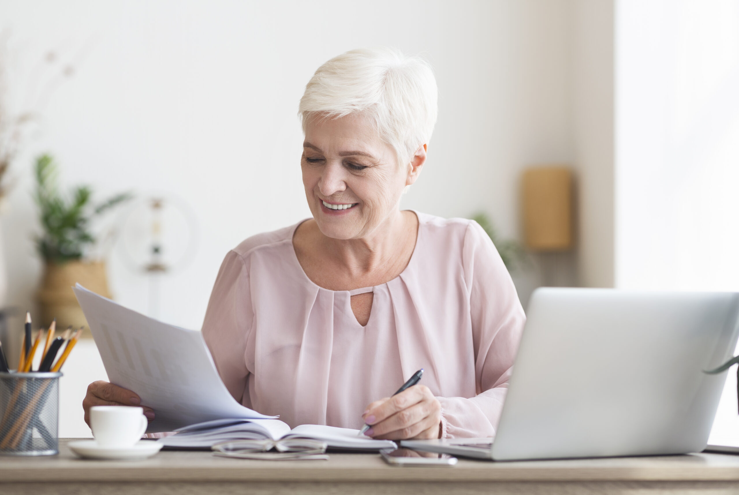 retired woman reviewing finances