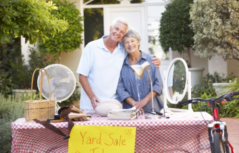 Older couple holding yard sale to pay off debt