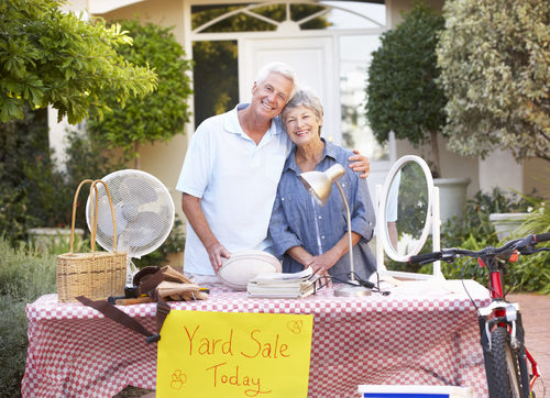 Older couple holding yard sale to pay off debt