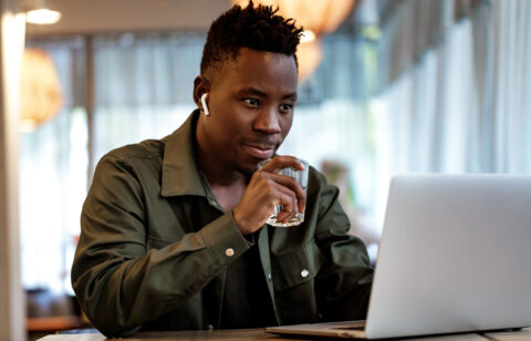 african american man using computer