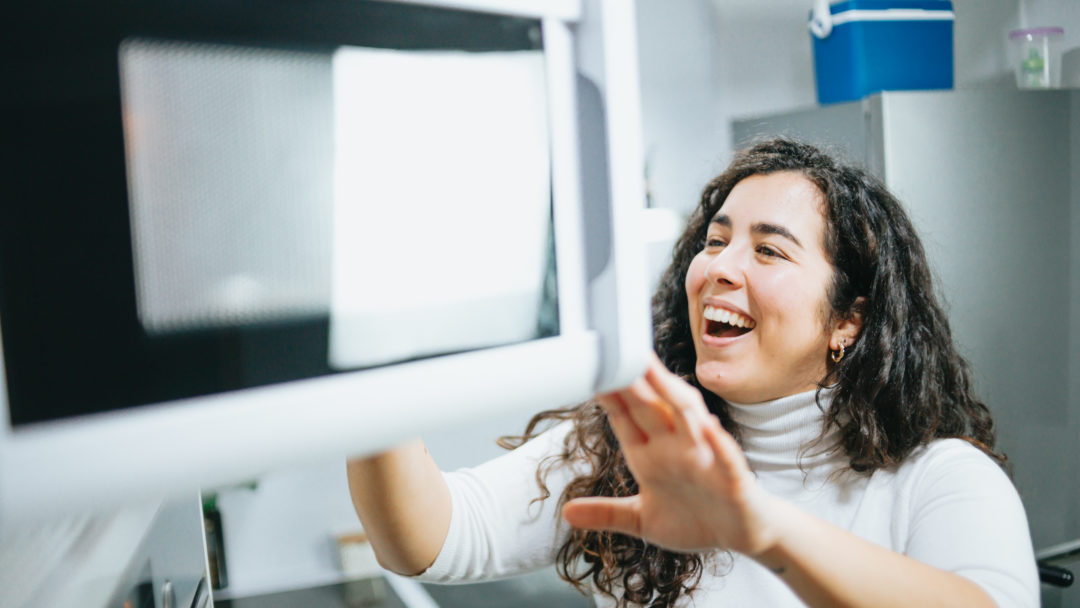 young woman making a microwave mug meal