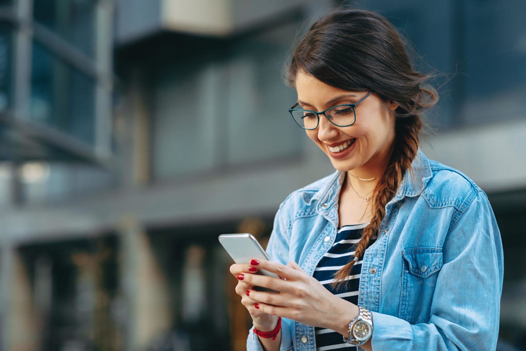 woman holding phone