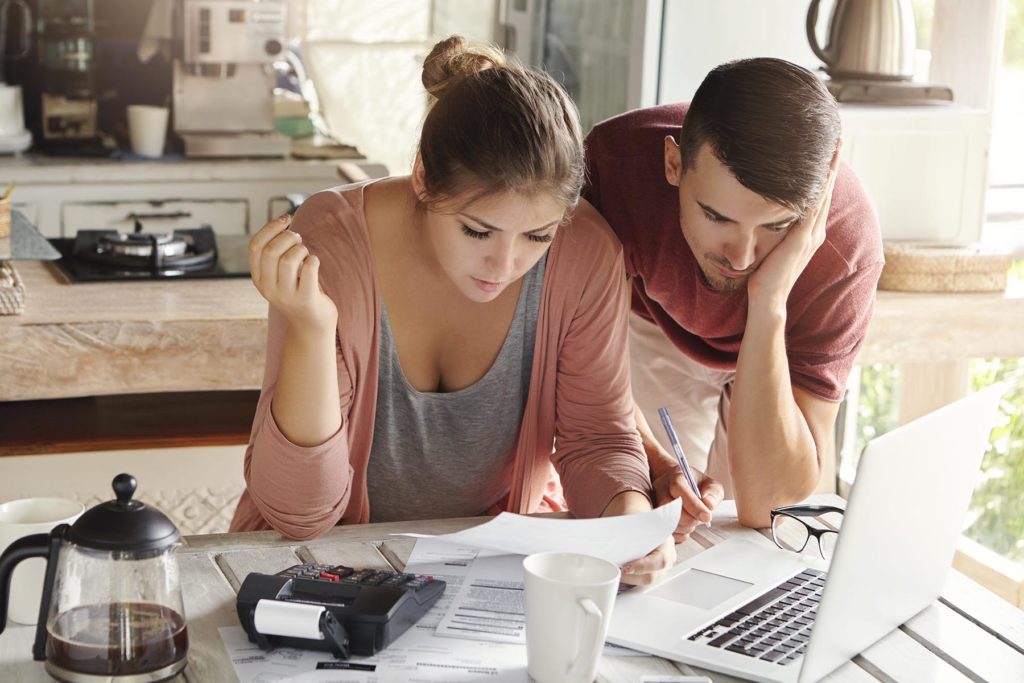 couple deciding between bankruptcy or credit counseling