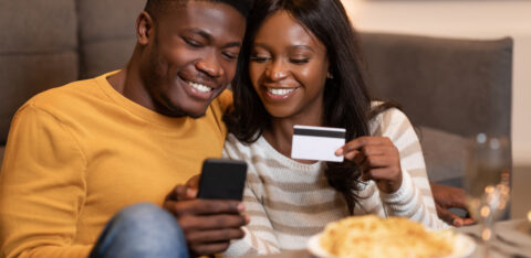 Couple earning credit card rewards points