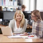 Women talking about paying tuition