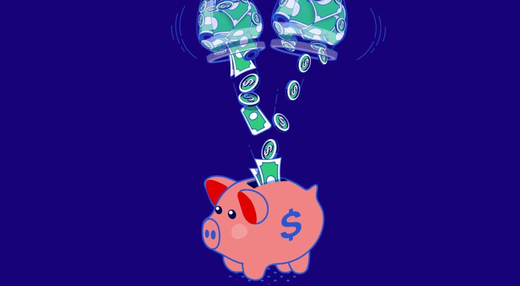 money going into a piggy bank