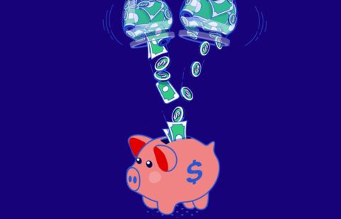 money going into a piggy bank