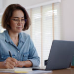 woman working on money management