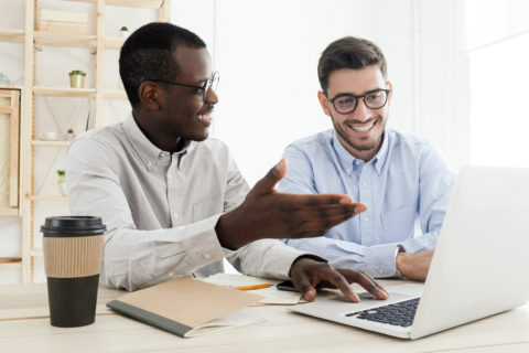 two men choosing a good debt relief company