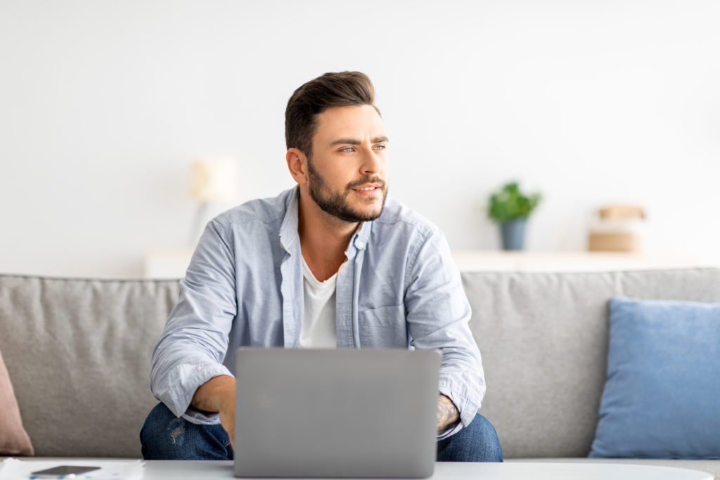 millennial freelancer working on laptop and lookin 2022 10 07 03 00 10 utc