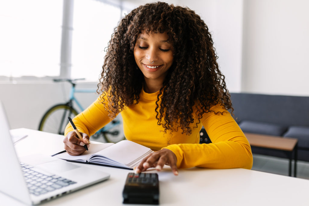 smiling african american woman working with comput 2022 07 12 05 42 19 utc