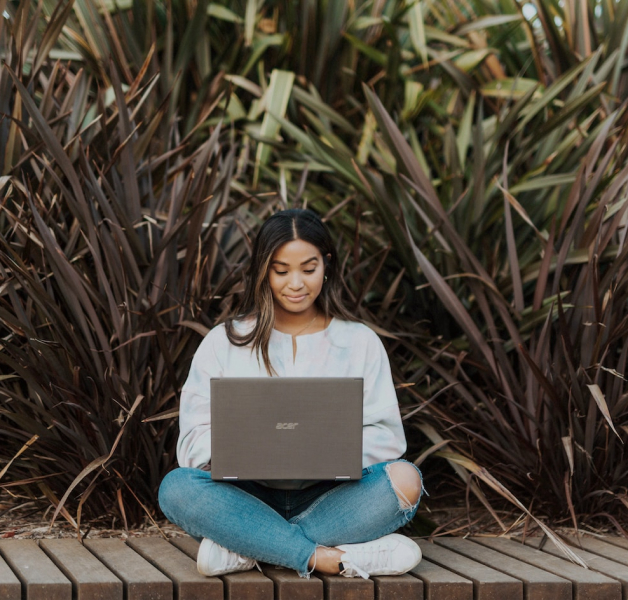 woman on computer paying off personal loan