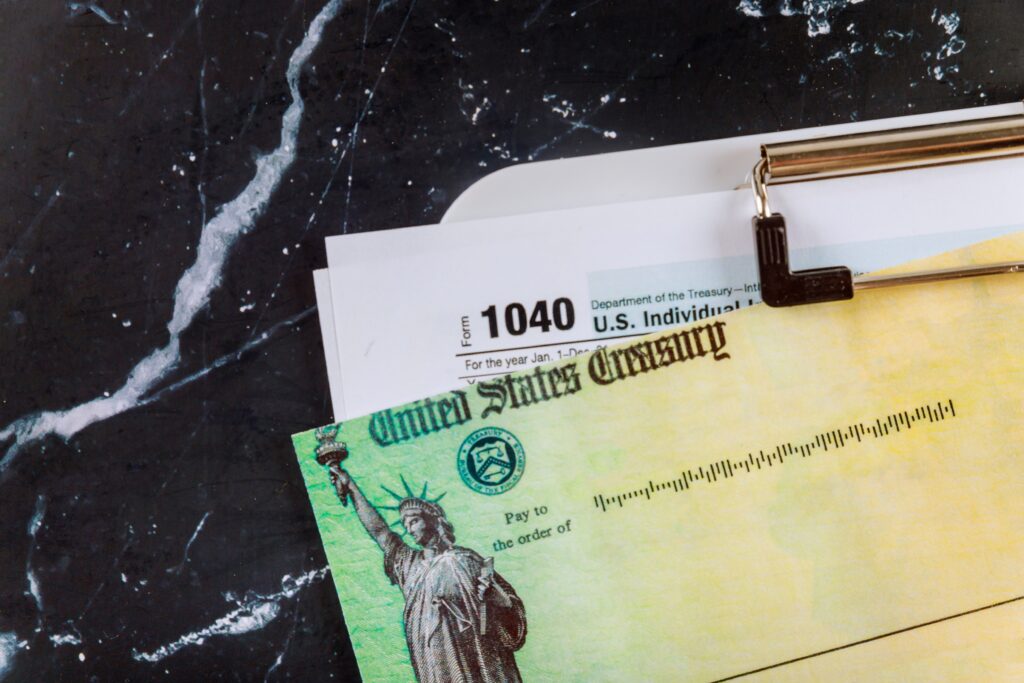 1040 Tax Form with Refund Check and stimulus refund check