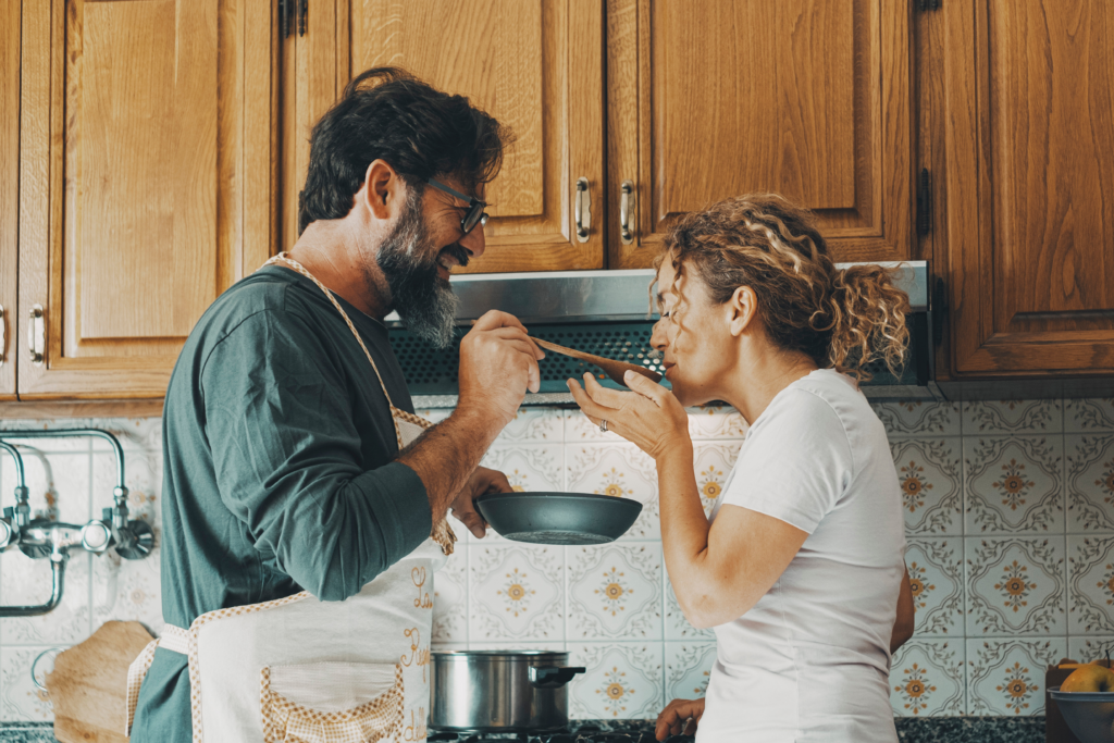 happy couple in a kitchen