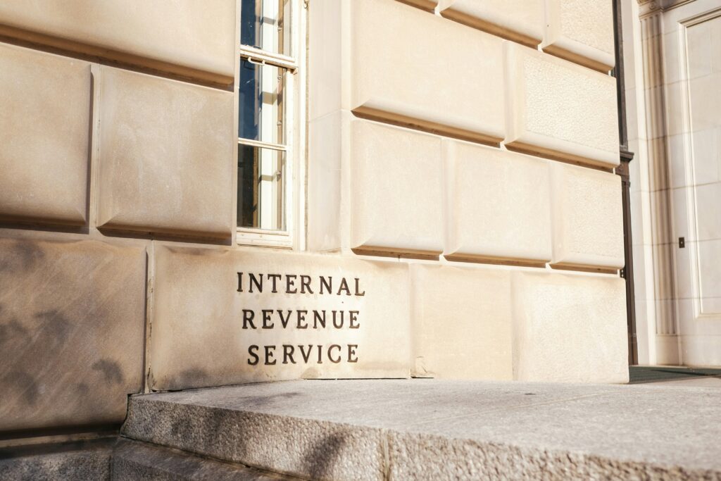 Exterior of the Internal Revenue Service building with engraved signage and classic stone architecture.