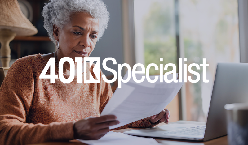 Senior woman reading papers while working on a laptop, overlaid with 401k Specialist logo.