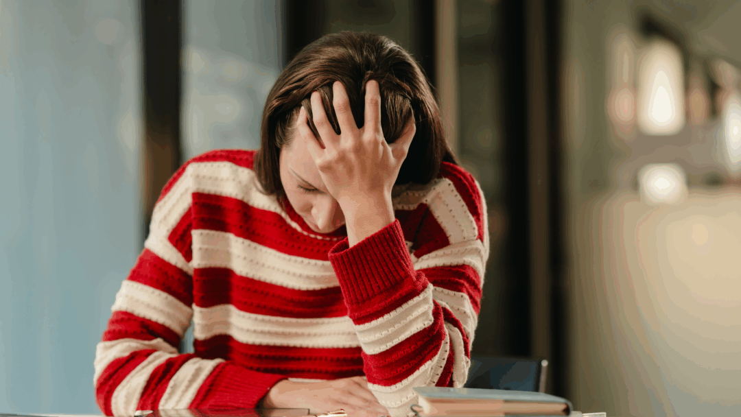 Senior couple meeting with a financial advisor and reviewing information on a tablet.
