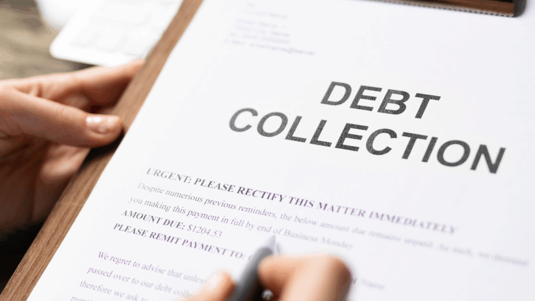 A person holds a clipboard with a document labeled “Debt Collection.”