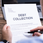 Person holding a debt collection notice with the words “Debt Collection” printed in large letters at the top.