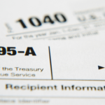 Close-up of IRS Form 1095-A with the title and tax form number visible.