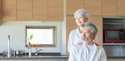 two older adults in a kitchen