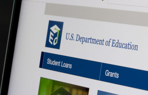 Close-up of the U.S. Department of Education website showing navigation for student loans and grants