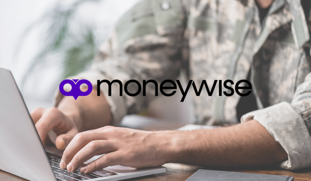Person in military uniform typing on a laptop at a desk with the Moneywise logo displayed prominently in the center.