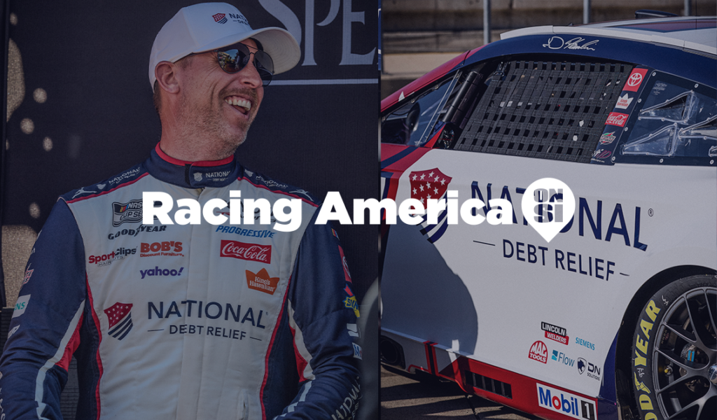 Denny Hamlin smiling in a National Debt Relief racing suit beside his No. 11 car, with “Racing America on SI” text overlay across the image.