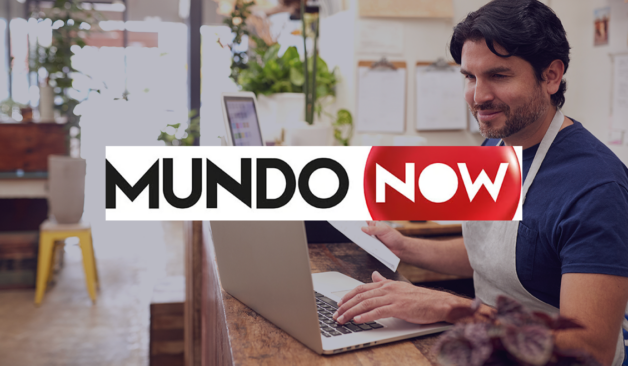 Man working on a laptop with the MundoNow logo overlaid on the image.