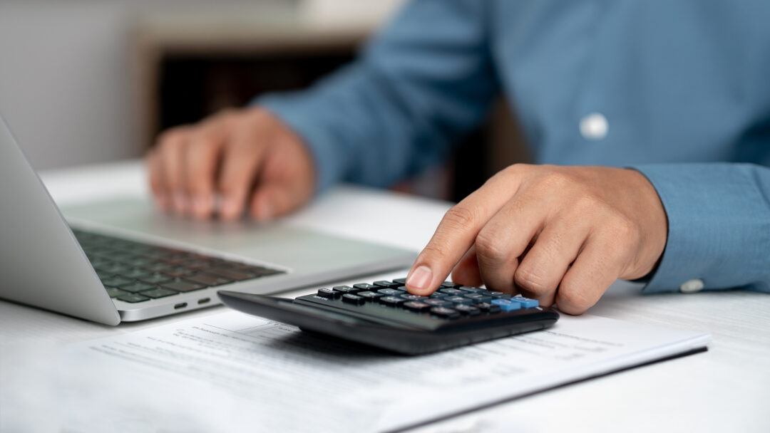 Modern business accounting management: Using technology for efficient tax calculations, accounting, assets, balance sheets, stock market statistics, and annual tax laws to protect businesses.